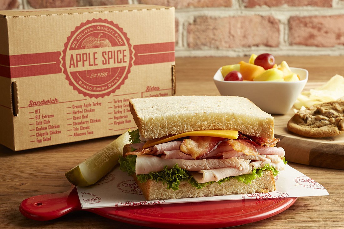 Each boxed lunch includes a sandwich or wrap, side dish, mint and a fresh cookie.