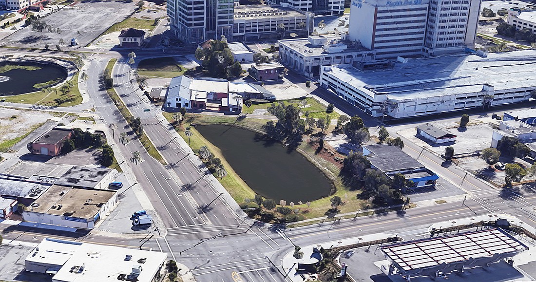 This retention pond at at Magnolia, Park and Forest streets could become a new Florida Blue parking garage. (Google)