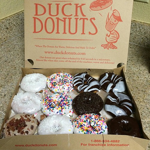Duck Donuts allows customers to create their own combination of coatings, toppings and drizzles on freshly made vanilla cake doughnuts.