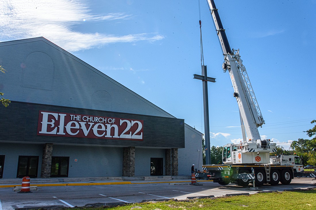 The cross is lifted at the Church of Eleven22 in Fleming Island. It&#39;s the church&#39;s sixth campus.
