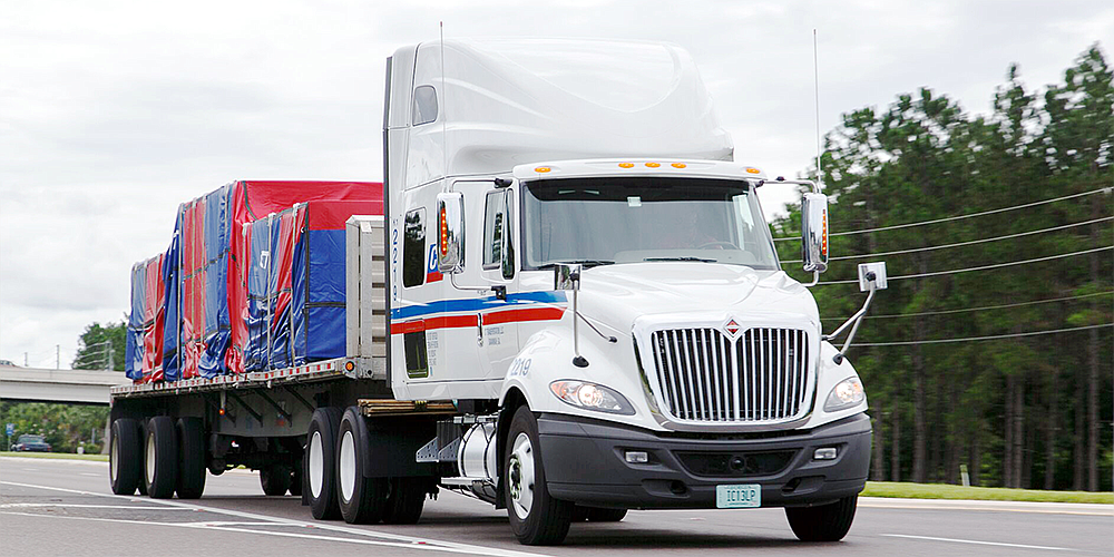 Comcar Industries is the parent company for four divisions offering national truck transportation services.
