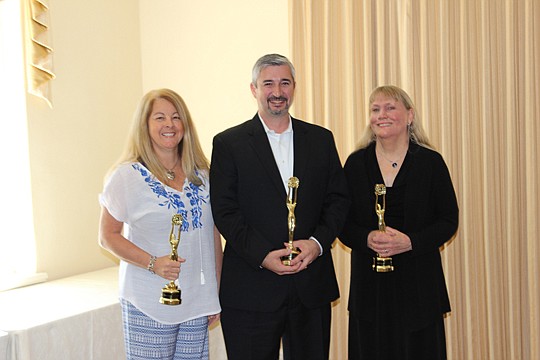 Jackie Darby, Jason Collins and Mary Caserta, all of John T. Ferreira &amp; Son, took Centurion Producer awards at the Century 21 North Florida council's awards ceremony.
