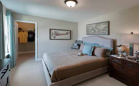 The bedroom with an Air Force theme was designed for a friend who participates in Bartram Trail High School's ROTC program. Charis included a photo of the young recruit with his "girlfriend," in the model.