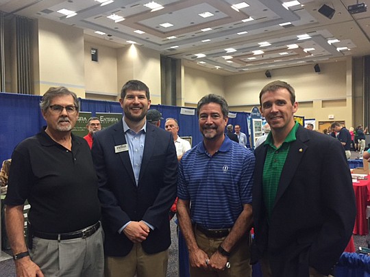 It's a meeting of the NEFBA presidential minds with Past President Curtis Hart (1996), Executive Officer Corey Deal, Past President Glenn Layton (2009) and 2016 President Chet Skinner at the Trade Expo.