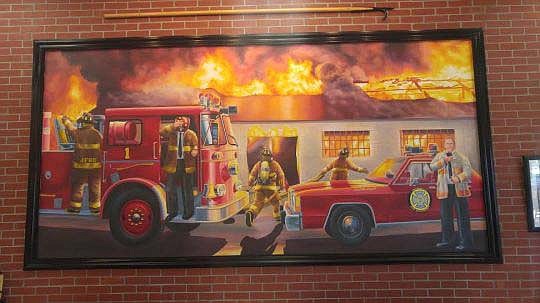 The late Max Leggett is featured in a mural at the Firehouse Subs shop in River City Marketplace. Leggett's son, Steve, is partnering with Firehouse founders, Robin and Chris Sorensen, to develop property in North Jacksonville. Max Leggett and the Sor...
