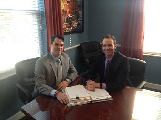 Troy Farquhar and Aaron Irving of Integrity Law volunteered to preserve woman's home.