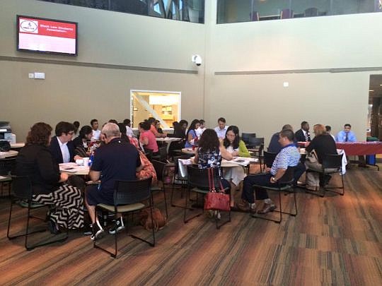 Attorneys and Florida Coastal School of Law students assist immigrants applying to become American citizens at last year's Citizenship Day.