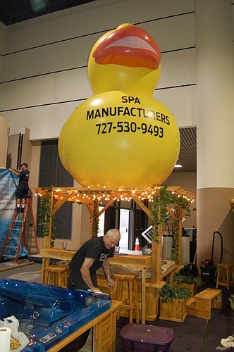 Bobby Woltz, sales manager at Spa Manufacturers Inc. in Clearwater, brought his product line -- and a large rubber duck -- to the Prime Osborn Convention Center on Wednesday. He's one of the exhibitors at the Home & Patio Show.