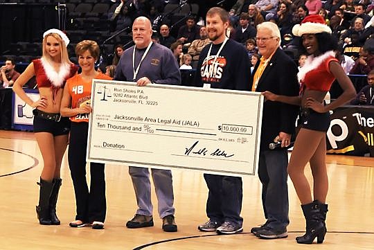 Jacksonville Giants owner Ron Sholes during a recent game donated $10,000 to Jacksonville Area Legal Aid. Sholes also is an attorney and made that evening's game in honor of the nonprofit legal firm.