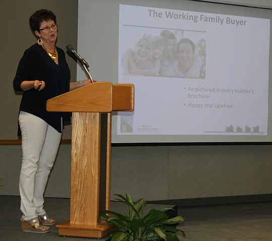 Jacksonville architect Deryl Patterson speaks during the June meeting of the Northeast Florida Builders Association Sales and Marketing Council meeting. Patterson said her functional home designs are a direct result of her experiences as a married mot...