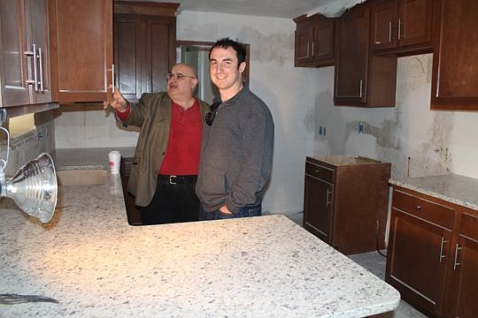 Alex Rose, right, owns Green Palm Realty in partnership with his father, Louis William Rose.