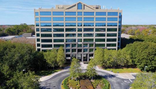 The 10-story Building 100 at the Bank of America office campus in Southside is one of two buildings being offered for lease to outside tenants. The park's owner wants to build another parking garage.
