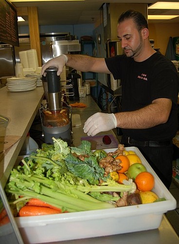 Daniel Isa uses fresh vegetables gathered each day from the Jacksonville Framers Market in all-natural smoothies and protein shakes served at D&G Deli at 233 E. Bay St.