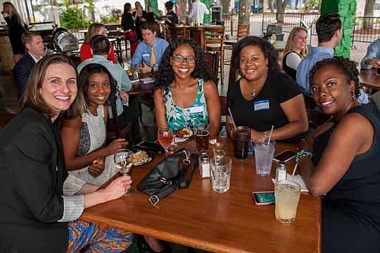 Gathered around the table for happy hour are, from left, Kelli Lueckert, Samantha Johnson, Chardea Murray, Joni Porter and Felicia Wilcox.