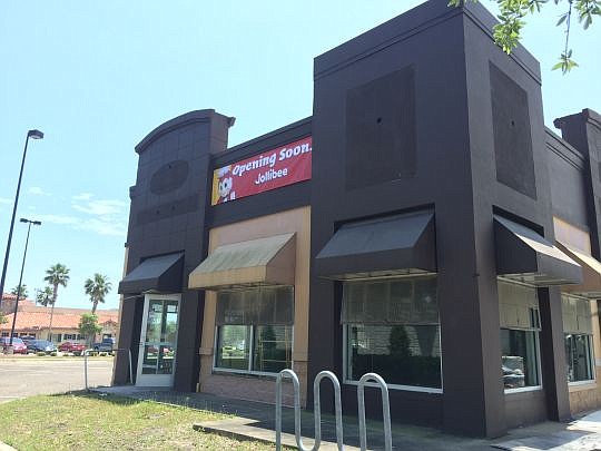 Signs are up at Kernan Village for the Jollibee fast-food restaurant.