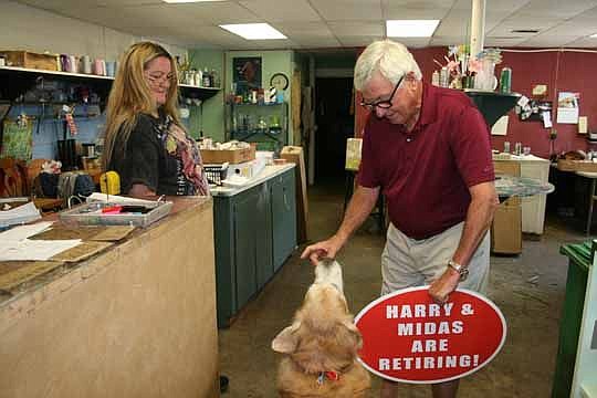 The sign says it all. Harry Schnabel - and his dog, Midas - are retiring from Seahorse Florist in Jacksonville Beach after 35 years.