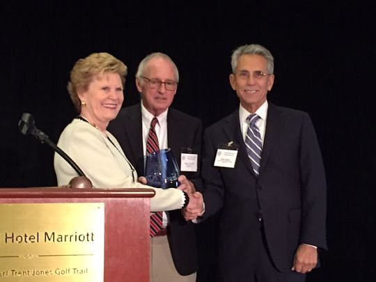 Hank Coxe, center, received the American Inns of Court Professionalism Award from Senior Judge Susan Black from the U.S. Court of Appeals for the 11th Circuit, and Senior Judge John Antoon of the Middle District of Florida. Coxe is a director at the B...