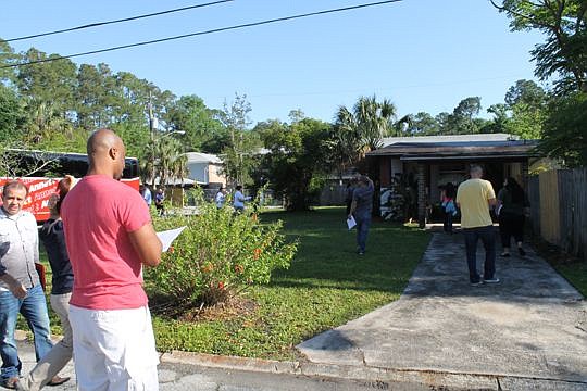 Students found out how to price repairs during a bus tour of seven investment properties in various stages of renovation. The trip was part of a three-day boot camp sponsored by the Jacksonville Real Estate Investment Association.