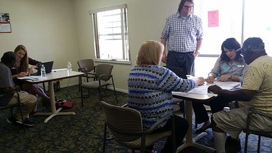 Attorneys and support staff from McGuireWoods on April 21 helped seniors at Campus Towers Apartments execute advance directives.