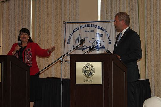 State Attorney Angela Corey and Public Defender Matt Shirk debate Wednesday at the Southside Business Men's Club meeting at the San Jose Country Club.