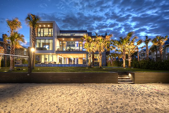 The Atlantic Beach oceanfront home has five bedrooms, 4.5 baths and a four-car garage. The three-story home is 6,213 square feet and includes an elevator.