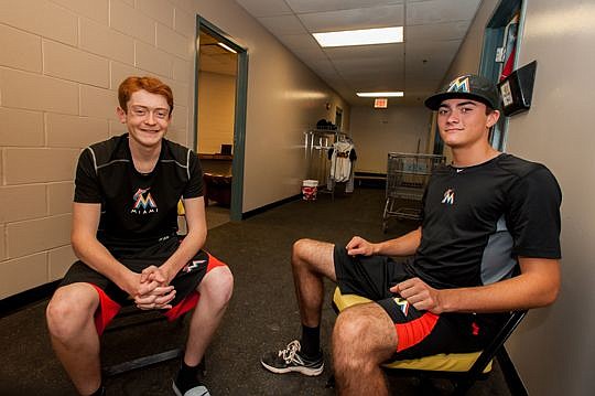 In a hallway in the clubhouse, Jacksonville Suns bat boys Hank Whitehouse, 16, and Ben Wright, 17, talk about what it's like to be a bat boy for the minor league professional baseball team.
