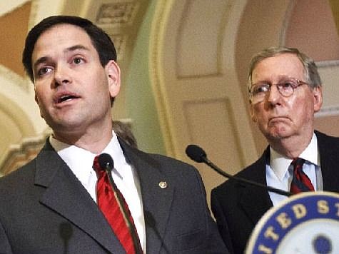 U.S. Senate Majority Leader Mitch McConnell, right, is pushing for Sen. Marco Rubio, R-Fla., to seek re-election.