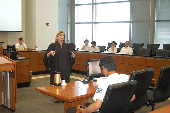 U.S. District Judge Marcia Morales Howard showed a group of Japanese high school lacrosse players around the federal courthouse Tuesday.