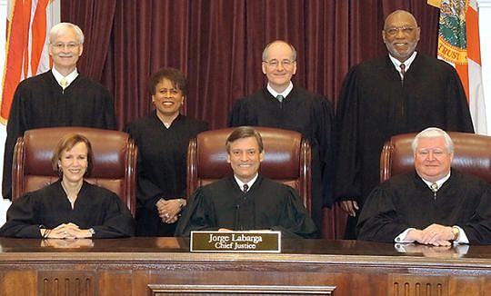 The Florida Supreme Court will rule in a case concerning the constitutionality of limits on damages in malpractice lawsuits.