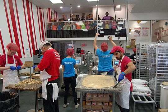 A balcony overlooks the kitchen at Sweet Pete's in the former Seminole Club so children on field trips can watch the candy being made.