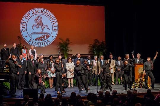 The Ritz Sound and Vocal Performers sing with the members of the City Council to close out the annual installation ceremony Thursday at the Ritz Theatre &amp; Museum.