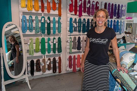Rethreaded founder Kristin Keen in the nonprofit's Barnett Street warehouse.