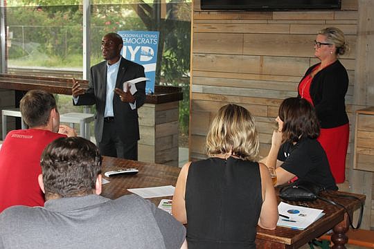 City Council member Garrett Dennis and Kerri Stewart, Mayor Lenny Curry's chief of staff, sold the merits of the mayor's pension plan to about two dozen people at a Jacksonville Young Democrats meeting Wednesday.