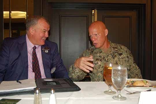 Rotary Club of Jacksonville President Bryan Cooksey, left, and Vice Adm. Sean Pybus, deputy commander of U.S. Special Operations Command.