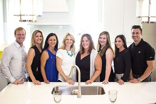 Keller Williams Jacksonville Realty broker CC Underwood, second from left, meets with members of her team, from left, CaseyÂ Czapla,Â Sharminee Lopez,Â Kristie Shores, MelissaÂ Ricks, AshleyÂ Langone and Lindsey Rutherford, and Movement Mortgage loan ...