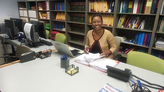 Florida Coastal School of Law student Dina Hunter prepares case materials for filing.