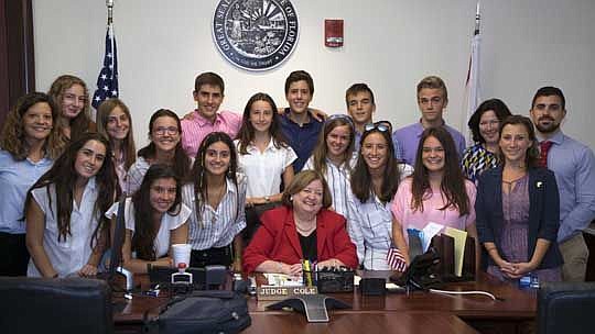 More than a dozen Spanish exchange students visited the Duval County Courthouse last week for a tour that included a discussion with Circuit Judge Karen Cole, seated, about the structure of the U.S. and Florida court systems. The students also watched...