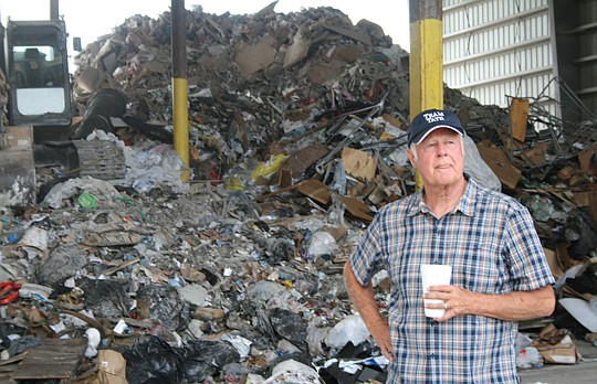 Joe Tate and Jacksonville City Council member Bill Gulliford say the city's landfill fee structure and the state government's refusal to enforce its rules contributed to Coastal Recycling Services going out of the recycling business. Tate, pictured at...