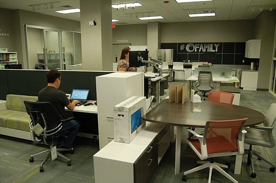 Office Creations sales representatives and administrative staff work in the showroom, which allows clients to see the products in use.