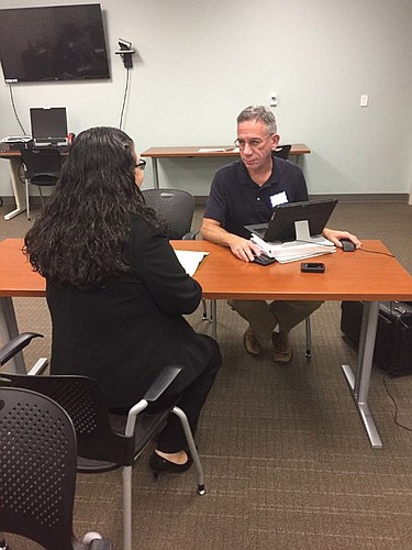Charles Trippe provides legal guidance at the Veterans Legal Collaborative session Friday.