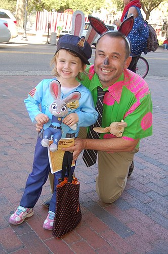 Three-year-old Samantha Gordon and her father, Downtown Vision Inc. CEO Jake Gordon, were among hundreds of people who walked around Downtown on Monday in their Halloween costumes, collecting candy during the fourth annual Trick or Treat on the Street...