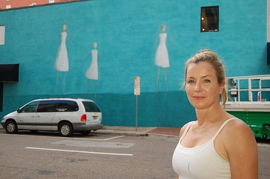 Artist RenÃ© Romero Schuler was getting ready to clean her brushes at about 3 p.m. Thursday after finishing the newest Art (Re)public project Downtown along Monroe Street near Laura Street. The mission of the program, a series of 10 murals in the urba...