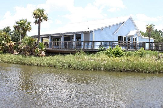 The shell of the Palms Fish Camp restaurant off Heckscher Drive could soon be completed by a group of neighborhood individuals looking to restore the site to its former status.