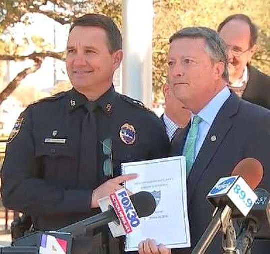 Sheriff Mike Williams and Jacksonville University President Tim Cost at a news conference to release task force reports.