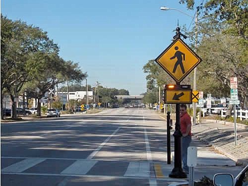 Rectangular Rapid Flashing Beacons similar to this one have been installed at 10 mid-block crosswalks in Duval County in an effort to help motorists avoid hitting pedestrians and cyclists.