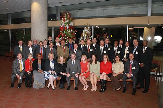 Fourth Judicial Circuit judges gather for the group photo at the annual Bench &amp; Bar holiday party Wednesday at the Wells Fargo Center. The event is presented by The Jacksonville Bar Association.