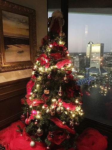 The University Club, decorated for the holidays, is wrapping up operations this weekend in Riverplace Tower after almost 50 years in business.