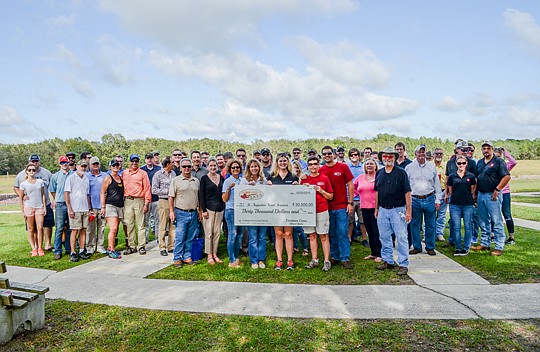 Davidson Cares raised $30,000 for St. Augustine Youth Services last month during Shooting for SAYS sporting clay shoot. Davidson Cares is the charitable arm of Davidson Realty.