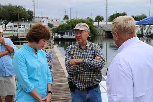 U.S. Rep. Gwen Graham, D-Fla., was joined on a "work day" with the Indian riverkeeper by her father, former Gov. and U.S. Sen. Bob Graham. He performed more than 100 workdays during his initial campaign for governor and continued them throughout his p...