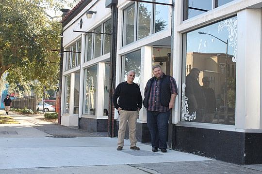 Evan Gould, left, and Lee Hamby outside 112 E. Adams St., where 5 & Dime is renting space. The five storefronts, adjacent to the now-closed Burro Bar and Chomp Chomp, total 3,400 square feet. The group had considered working out of the theater room in...